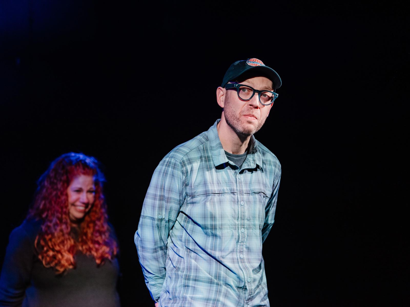 Erik on stage in Spokane, looking sheepish